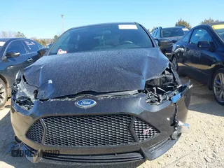 2014 Ford Focus ST with VIN 1FADP3L99EL191826, listed as a IAAI auction lot 41526553 with 131,131 mi miles and . Bid and sale history available at carsss.com. Image 12.