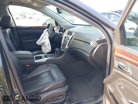 2012 Cadillac SRX Luxury Collection z VIN 3GYFNAE39CS659562, wystawiony jako IAAI lot #42109525 z przebiegiem 151 051 mil mil oraz . Historia ofert i sprzedaży dostępna na DreamBid. Obrazek 5.
