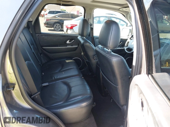 2006 Mercury Mariner Luxury with VIN 4M2YU57166KJ17723, listed as a IAAI auction lot 41818695 with 136,881 mi miles and . Bid and sale history available at DreamBid. Image 8.