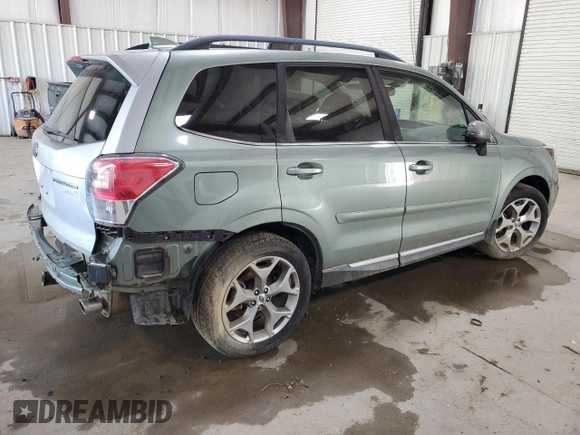 2017 Subaru Forester Touring with VIN JF2SJAWC5HH572306, listed as a Copart auction lot 63699995 with Not provided miles and Salvage title. Bid and sale history available at DreamBid. Image 3.