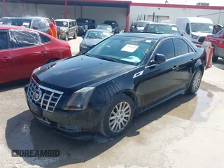2012 Cadillac CTS Sedan Luxury with VIN 1G6DG5E58C0115323, listed as a IAAI auction lot 42002818 with 107,226 mi miles. Bid and sale history available at carsss.com. Image 2.