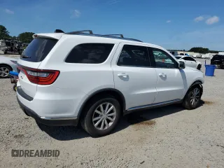 2015 Dodge Durango SXT z VIN 1C4RDHAG0FC147402, wystawiony jako Copart lot #61728915 z przebiegiem 107 104 mil mil oraz Szkoda całkowita • Salvage title. Historia ofert i sprzedaży dostępna na DreamBid. Obrazek 3.