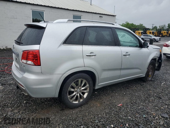2011 Kia Sorento SX with VIN 5XYKW4A2XBG099857, listed as a Copart auction lot 56946015 with 195,457 mi miles and Salvage title. Bid and sale history available at DreamBid. Image 3.