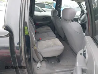2003 Ford F-150 XLT with VIN 1FTRW07613KD14135, listed as a IAAI auction lot 41879756 with 197,515 mi miles. Bid and sale history available at carsss.com. Image 8.