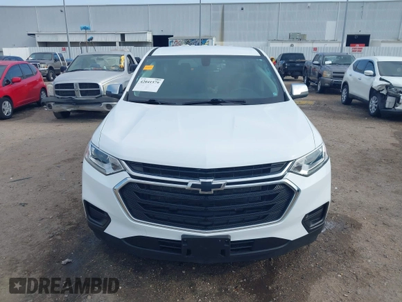 2021 Chevrolet Traverse LS z VIN 1GNERFKW7MJ169763, wystawiony jako IAAI lot #42041579 z przebiegiem 59 840 mil mil oraz . Historia ofert i sprzedaży dostępna na DreamBid. Obrazek 12.
