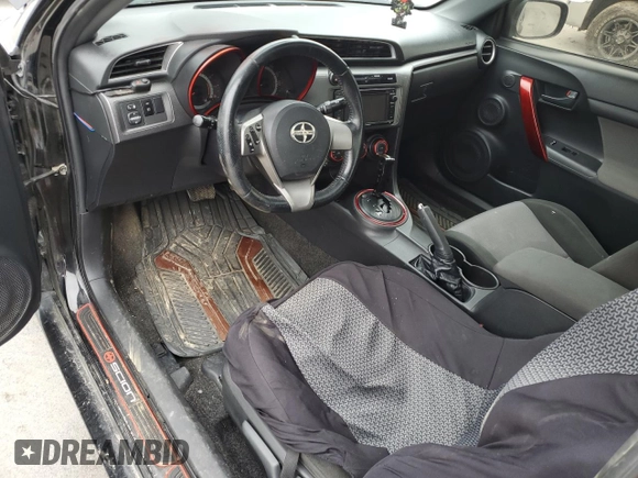 2014 Scion tC z VIN JTKJF5C72E3066945, wystawiony jako Copart lot #56125905 z przebiegiem Nie podano mil oraz Szkoda całkowita • Salvage title. Historia ofert i sprzedaży dostępna na DreamBid. Obrazek 8.