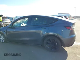 2023 Tesla Model Y Long Range with VIN 7SAYGAEEXPF714760, listed as a IAAI auction lot 41748398 with 49,802 mi miles and . Bid and sale history available at DreamBid. Image 15.