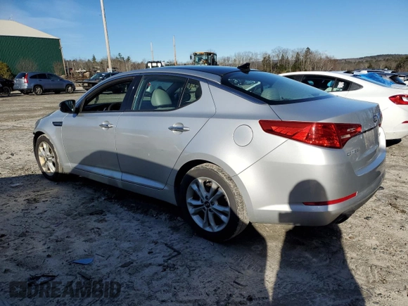 2011 Kia Optima EX with VIN KNAGN4A69B5175800, listed as a Copart auction lot 80205734 with 104,218 mi miles and Salvage Title. Bid and sale history available at carsss.com. Image 2.