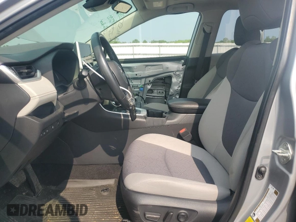 2023 Toyota RAV4 Hybrid XLE with VIN JTMRWRFV7PD166743, listed as a Copart auction lot 59964505 with 87,404 mi miles and Salvage title. Bid and sale history available at DreamBid. Image 7.