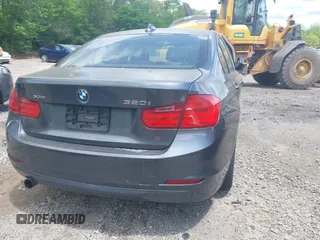 2014 BMW 3 Series 320i xDrive with VIN WBA3C3C57EP662795, listed as a IAAI auction lot 42267683 with 153,451 mi miles and . Bid and sale history available at DreamBid. Image 21.