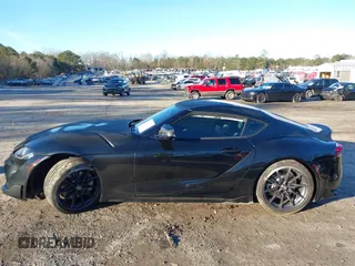 2024 Toyota GR Supra 3.0 with VIN WZ1DB0G01RW067364, listed as a IAAI auction lot 41330053 with 6,500 mi miles. Bid and sale history available at carsss.com. Image 14.
