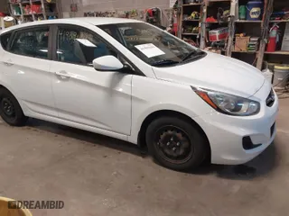 2013 Hyundai Accent GL with VIN KMHCT5AE1DU088241, listed as a IAAI auction lot 41909194 with 87,622 mi miles. Bid and sale history available at carsss.com. Image 1.