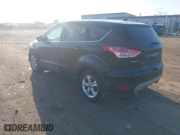 2015 Ford Escape SE with VIN 1FMCU0G79FUA40322, listed as a IAAI auction lot 41791960 with 124,543 mi miles. Bid and sale history available at carsss.com. Image 3.