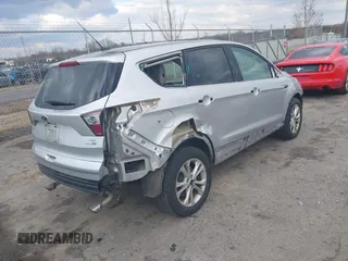 2017 Ford Escape SE z VIN 1FMCU9GDXHUA46689, wystawiony jako IAAI lot #41492523 z przebiegiem 67 401 mil mil oraz . Historia ofert i sprzedaży dostępna na DreamBid. Obrazek 4.