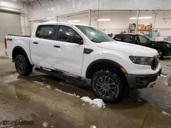 2023 Ford Ranger XL with VIN 1FTER4FH2PLE18522, listed as a Copart auction lot 43559915 with 13,529 mi miles and Salvage Title. Bid and sale history available at carsss.com. Image 4.