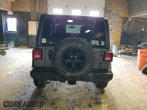 2023 Jeep Wrangler Willys z VIN 1C4HJXAG6PW530632, wystawiony jako Copart lot #54783035 z przebiegiem 6 451 mil mil oraz Szkoda całkowita • Salvage title. Historia ofert i sprzedaży dostępna na DreamBid. Obrazek 6.