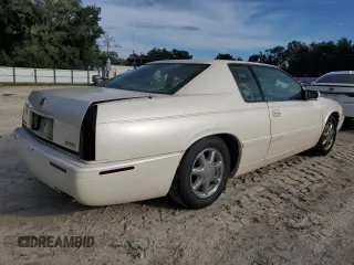 2001 Cadillac Eldorado Touring ETC z VIN 1G6ET12931B103758, wystawiony jako Copart lot #73787764 z przebiegiem Nie podano mil oraz Szkody całkowita. Historia ofert i sprzedaży dostępna na DreamBid. Obrazek 3.