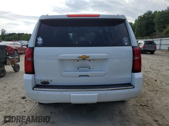 2016 Chevrolet Tahoe LTZ z VIN 1GNSKCKC4GR208861, wystawiony jako Copart lot #56832895 z przebiegiem 132 982 mil mil oraz Szkoda całkowita • Salvage title. Historia ofert i sprzedaży dostępna na DreamBid. Obrazek 6.