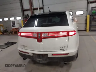 2013 Lincoln MKT EcoBoost with VIN 2LMHJ5AT3DBL56954, listed as a IAAI auction lot 41705877 with 148,771 mi miles. Bid and sale history available at carsss.com. Image 16.
