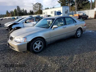 1999 Acura RL with VIN JH4KA9652XC007679, listed as a Copart auction lot 76130054 with 0 mi miles and Salvage Title. Bid and sale history available at carsss.com. Image 1.