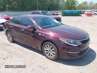2018 Kia Optima LX z VIN 5XXGT4L39JG259153, wystawiony jako IAAI lot #42076003 z przebiegiem 191 321 mil mil oraz . Historia ofert i sprzedaży dostępna na DreamBid. Obrazek 1.