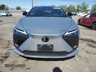 2024 Lexus RZ 300e Premium z VIN JTJABABB6RA002164, wystawiony jako Copart lot #56575245 z przebiegiem 11 687 mil mil oraz Szkoda całkowita • Salvage title. Historia ofert i sprzedaży dostępna na DreamBid. Obrazek 5.