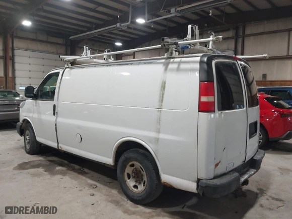 2009 GMC Savana Cargo Van with VIN 1GTGG25C591169155, listed as a IAAI auction lot 41585796 with 157,610 mi miles. Bid and sale history available at carsss.com. Image 3.