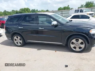 2014 Dodge Durango SXT z VIN 1C4RDHAG0EC597419, wystawiony jako IAAI lot #42534064 z przebiegiem 199 676 mil mil oraz . Historia ofert i sprzedaży dostępna na DreamBid. Obrazek 13.