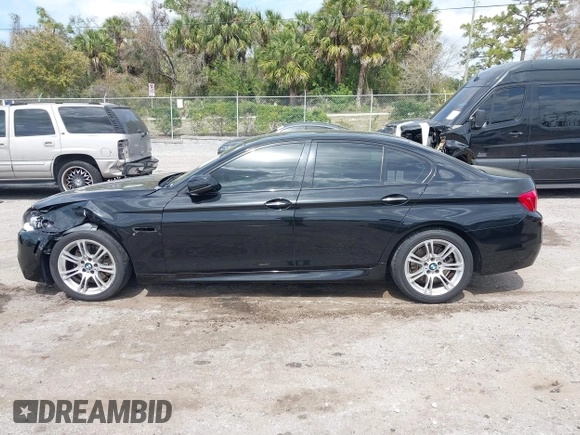 2013 BMW 5 Series 528i with VIN WBAXG5C51DDY33333, listed as a IAAI auction lot 41685179 with 94,936 mi miles and . Bid and sale history available at carsss.com. Image 14.