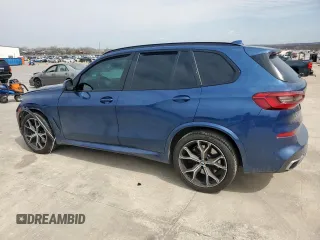 2019 BMW X5 xDrive50i with VIN 5UXJU2C5XKLN66811, listed as a Copart auction lot 48597115 with 0 mi miles and Salvage Title. Bid and sale history available at carsss.com. Image 2.