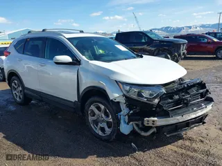 2019 Honda CR-V EX-L with VIN JHLRW2H81KX006771, listed as a IAAI auction lot 41670636 with 82,848 mi miles. Bid and sale history available at carsss.com. Image 1.