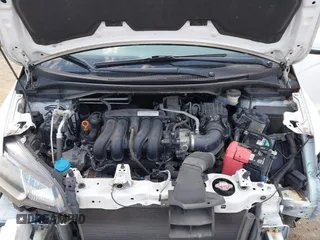 2016 Honda Fit LX with VIN JHMGK5H59GX007518, listed as a IAAI auction lot 41899665 with 68,188 mi miles. Bid and sale history available at carsss.com. Image 10.