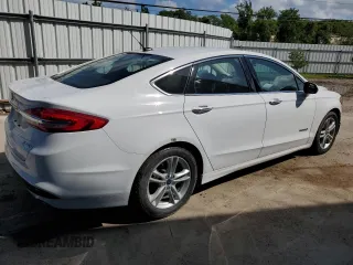 2018 Ford Fusion SE z VIN 3FA6P0LU0JR171651, wystawiony jako Copart lot #58311204 z przebiegiem 124 785 mil mil oraz Czysty tytuł • Clean title. Historia ofert i sprzedaży dostępna na DreamBid. Obrazek 3.