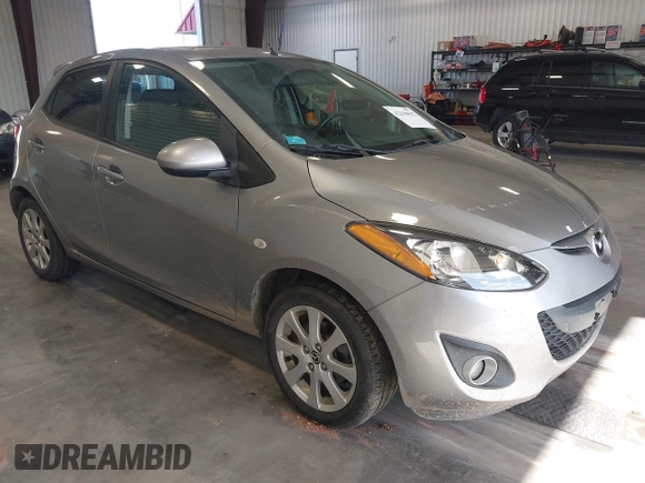 2014 Mazda 2 Touring z VIN JM1DE1LY2E0174833, wystawiony jako IAAI lot #42250632 z przebiegiem 90 168 mil mil oraz . Historia ofert i sprzedaży dostępna na DreamBid. Obrazek 1.