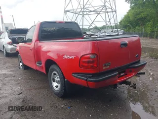 2003 Ford F-150 XL with VIN 1FTRF072X3KD59295, listed as a IAAI auction lot 42307031 with 136,679 mi miles and . Bid and sale history available at DreamBid. Image 3.