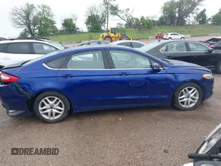 2016 Ford Fusion SE with VIN 1FA6P0HD4G5107018, listed as a IAAI auction lot 42403573 with 115,978 mi miles and . Bid and sale history available at DreamBid. Image 14.