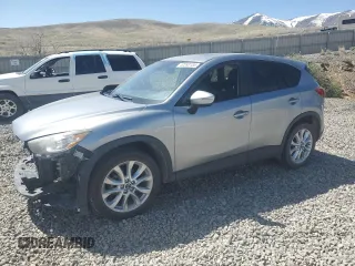 2015 Mazda CX-5 Grand Touring with VIN JM3KE4DY5F0540655, listed as a Copart auction lot 52893155 with 152,279 mi miles and Salvage Title. Bid and sale history available at carsss.com. Image 1.