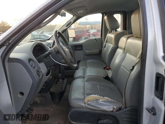 2007 Ford F-150 XL with VIN 1FTRF14V97NA49566, listed as a Copart auction lot 82015904 with 116,627 mi miles and Salvage title. Bid and sale history available at DreamBid. Image 7.