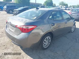 2018 Toyota Corolla L z VIN 2T1BURHE9JC971913, wystawiony jako IAAI lot #42220378 z przebiegiem 113 437 mil mil oraz . Historia ofert i sprzedaży dostępna na DreamBid. Obrazek 4.