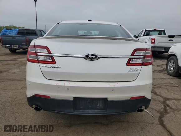 2015 Ford Taurus SEL z VIN 1FAHP2E89FG100466, wystawiony jako Copart lot #56887395 z przebiegiem 109 233 mil mil oraz Szkoda całkowita • Salvage title. Historia ofert i sprzedaży dostępna na DreamBid. Obrazek 6.