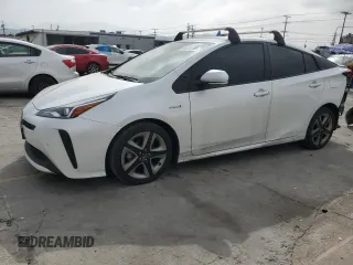 2021 Toyota Prius L Eco with VIN JTDKAMFUXM3149396, listed as a Copart auction lot 61874195 with 126,473 mi miles and Salvage title. Bid and sale history available at DreamBid. Image 1.