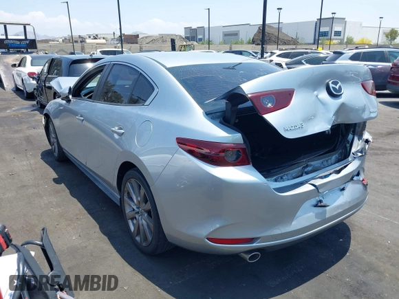 2020 Mazda 3 Select with VIN 3MZBPACL1LM131999, listed as a IAAI auction lot 42433532 with 23,067 mi miles and . Bid and sale history available at DreamBid. Image 3.
