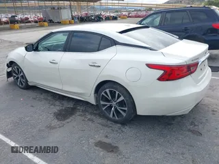 2016 Nissan Maxima SR with VIN 1N4AA6AP4GC449440, listed as a IAAI auction lot 41756271 with 136,685 mi miles and . Bid and sale history available at DreamBid. Image 3.