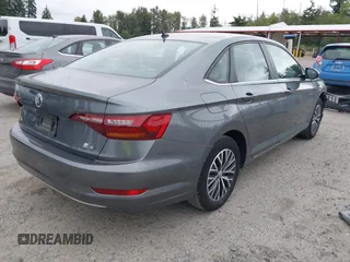 2019 Volkswagen Jetta S with VIN 3VWC57BU5KM223056, listed as a IAAI auction lot 42696119 with 56,586 mi miles and . Bid and sale history available at DreamBid. Image 4.