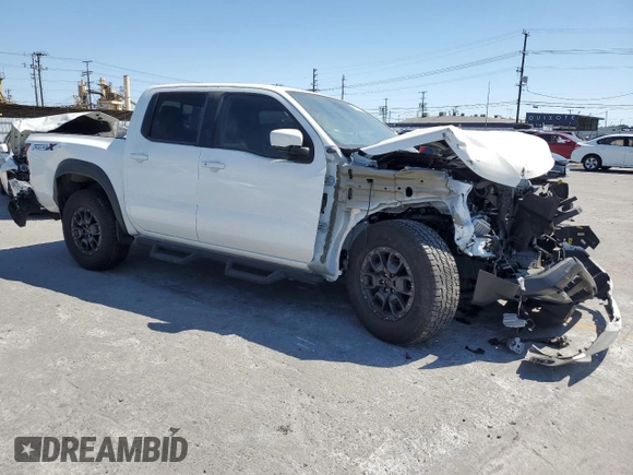 2023 Nissan Frontier SV with VIN 1N6ED1EJ3PN670640, listed as a Copart auction lot 58039525 with 15,302 mi miles and Salvage title. Bid and sale history available at DreamBid. Image 4.