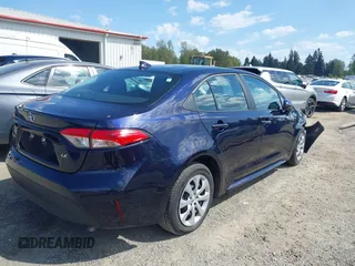 2023 Toyota Corolla LE with VIN 5YFB4MDE2PP052532, listed as a IAAI auction lot 42169698 with 32,622 mi miles. Bid and sale history available at carsss.com. Image 4.