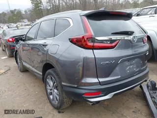 2021 Honda CR-V Touring with VIN 2HKRW2H93MH675015, listed as a IAAI auction lot 41711953 with 58,287 mi miles. Bid and sale history available at carsss.com. Image 3.