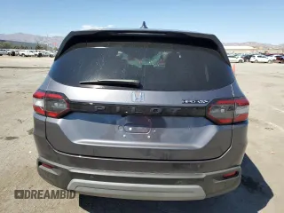 2023 Honda Pilot EX-L 8 Passenger with VIN 5FNYG2H42PB013197, listed as a Copart auction lot 69126264 with 19,243 mi miles and Salvage Title. Bid and sale history available at carsss.com. Image 6.