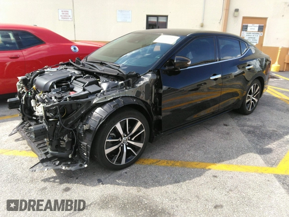 2021 Nissan Maxima SV with VIN 1N4AA6CV4MC506744, listed as a IAAI auction lot 42150465 with 70,056 mi miles and . Bid and sale history available at DreamBid. Image 2.