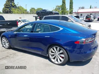 2016 Tesla Model S 90D with VIN 5YJSA1E48GF161604, listed as a IAAI auction lot 39977345 with 32,789 mi miles and . Bid and sale history available at DreamBid. Image 14.